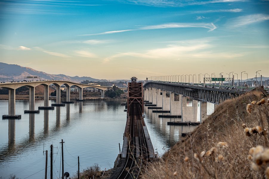 Bridge spanning water representing connection to your finances